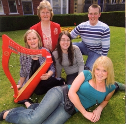 five harpists from Ceredigion, under the guidance of Delyth Evans, Telynores Mynach and Sian Ifan Price, Telynores Bro Ystwyth.
