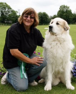 Photograph of Alyson Roberts and one of her Pyrenean Mountain Dogs